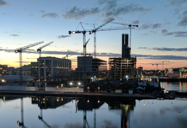940188956 Night time skyline of construction